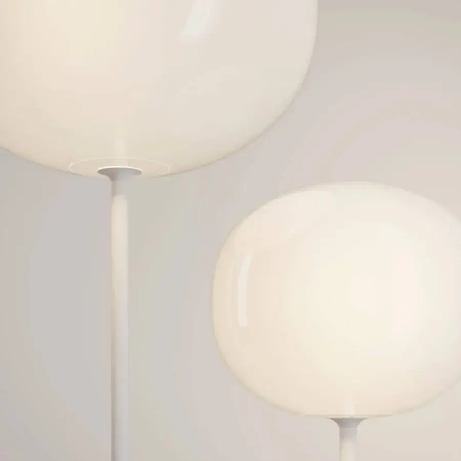 Superior Lodes Volum floor lamp with a glossy white blown glass shade and slender silhouette crafted in Italy