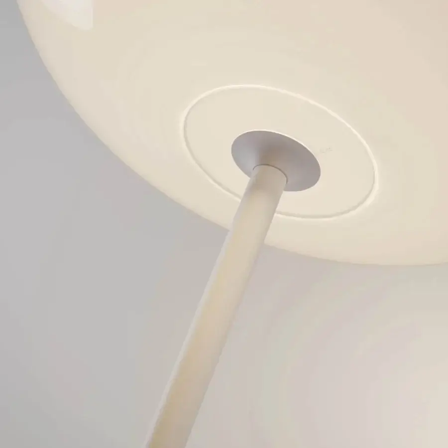 Elegant Lodes Volum floor lamp with a glossy white blown glass shade and slender aluminum stem crafted in Italy