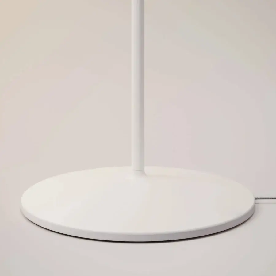 Distinguished Lodes Volum floor lamp with a glossy white blown glass diffuser and uniform white finish