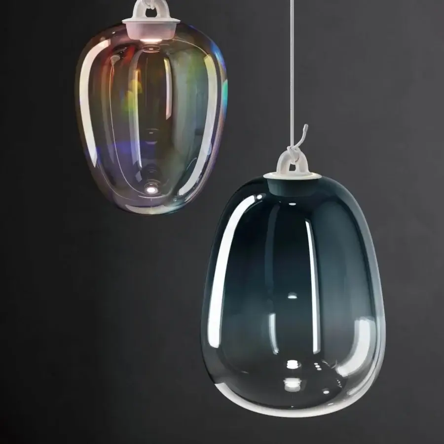Distinguished Lodes Oblò Single suspension lamp crafted in iridescent glass exhibiting teal and pearlescent tones with a white fabric cable