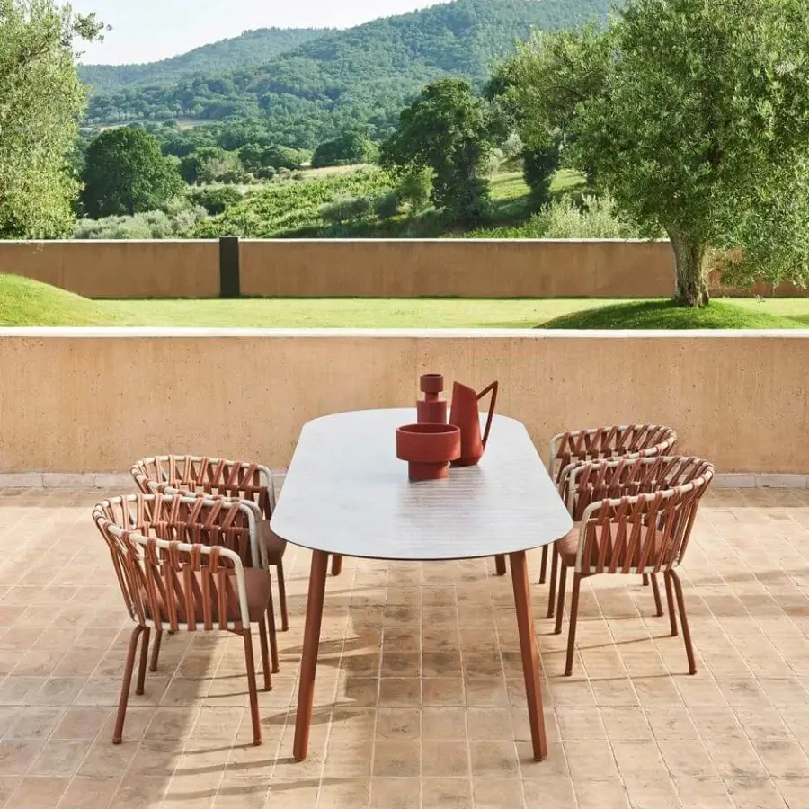 Exceptional Varaschin Emma Cross armchair with reddish-brown woven fiber rope and powder-coated aluminum frame built for outdoor use