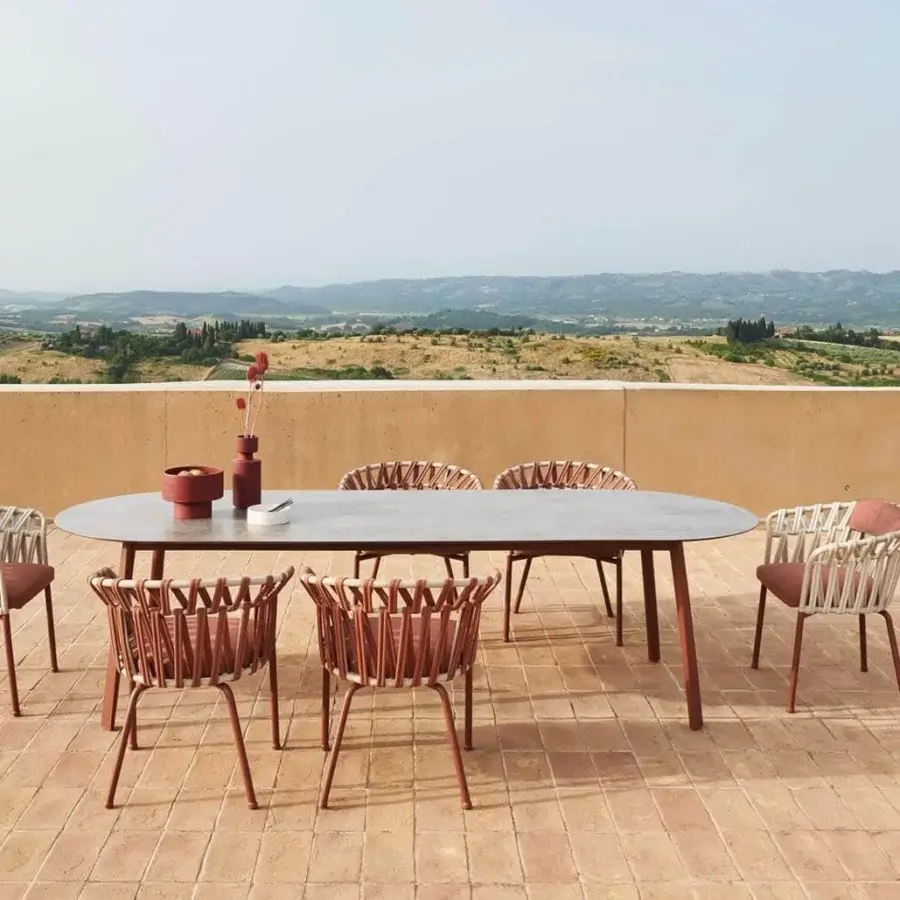 Sophisticated Varaschin Emma Cross armchair with light beige fiber rope and reddish-brown acrylic fabric, built with a matte powder-coated aluminum frame