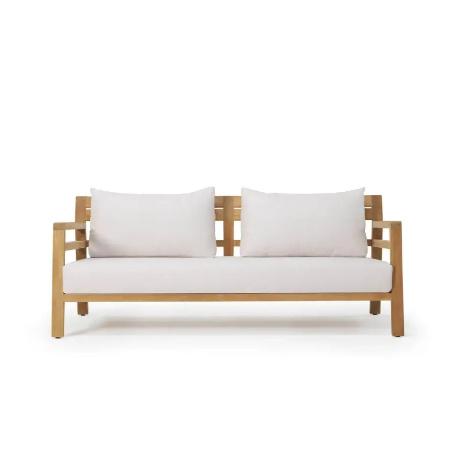 Timeless Ethimo Costes sofa crafted with FSC-certified teak wood and light beige cushions in a natural finish