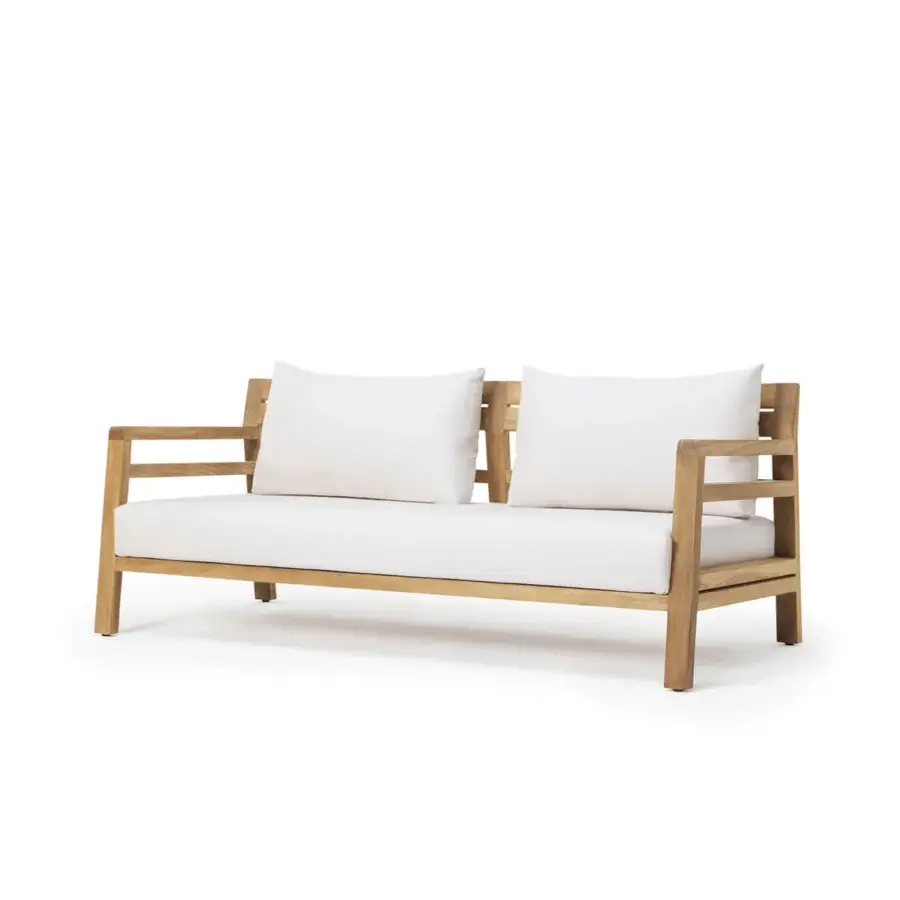 Distinguished Ethimo Costes sofa crafted with FSC-certified teak wood in a natural finish and generously filled white textile cushions