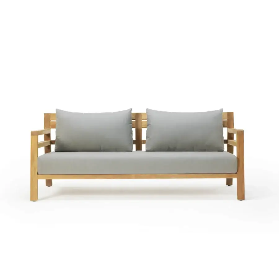 Lavish Ethimo Costes sofa crafted with FSC-certified teak wood in a natural finish with light gray cushions