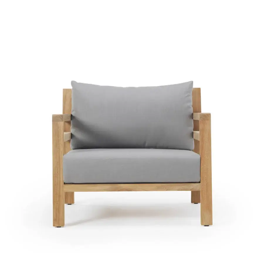 Refined Ethimo Costes lounge chair with FSC-certified teak and light gray cushions offering a pickled finish