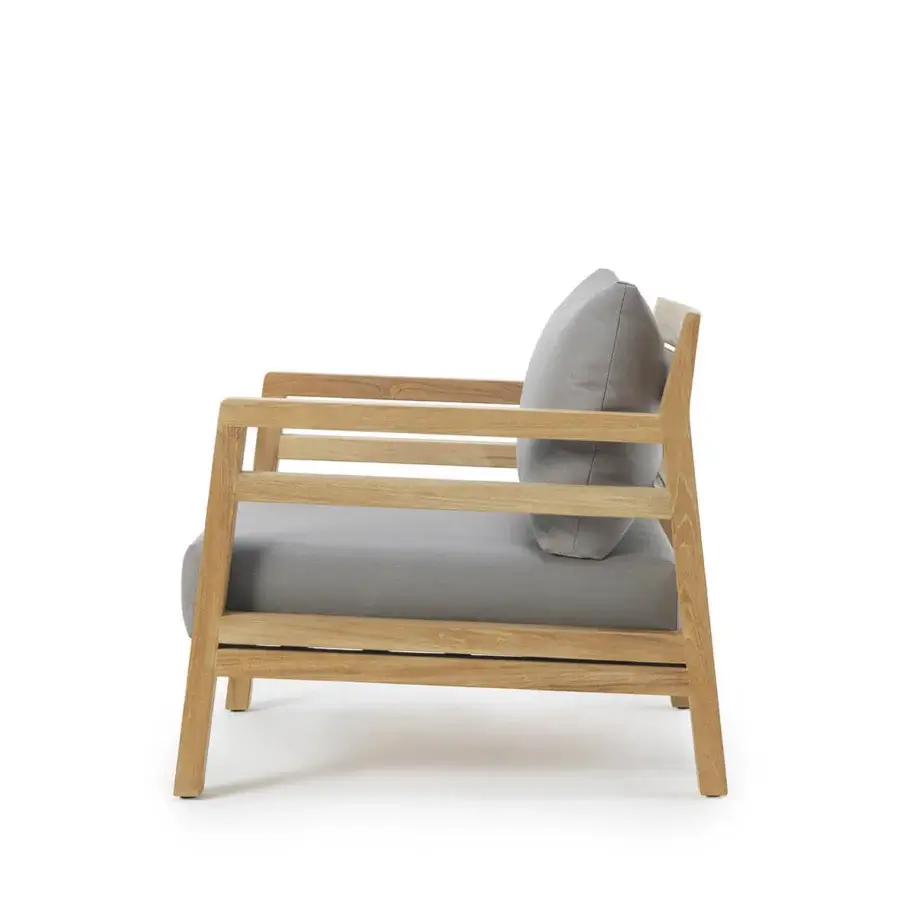 Superior Ethimo Costes lounge chair with FSC-certified teak and a gray textile cushion in a worn pickled finish