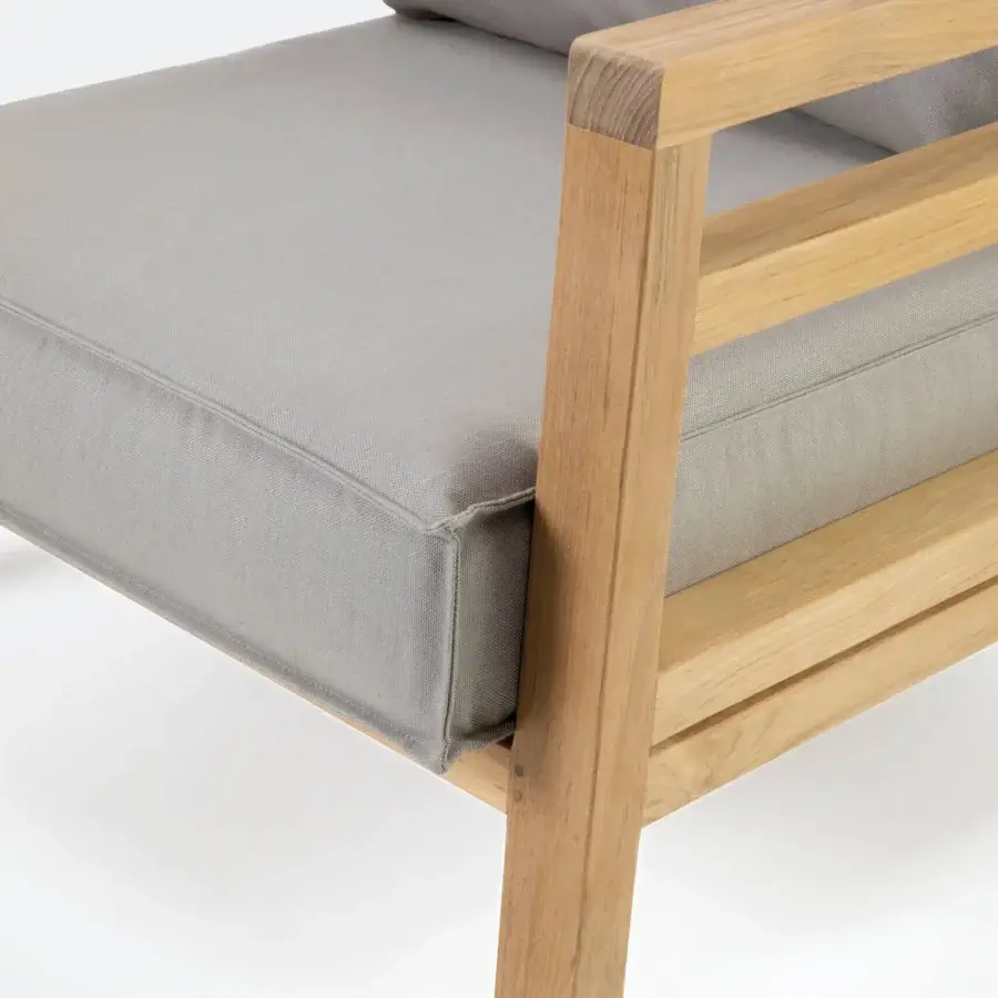 Exceptional Ethimo Costes lounge chair crafted with FSC-certified teak and neutral gray cushions in a charming pickled finish