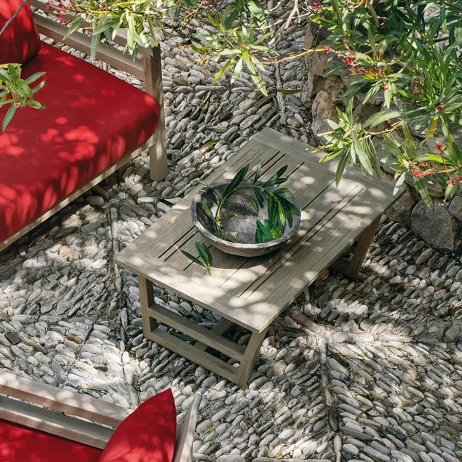 Exceptional Ethimo Costes coffee table crafted in natural teak with a charming worn pickled finish and visible wood grain
