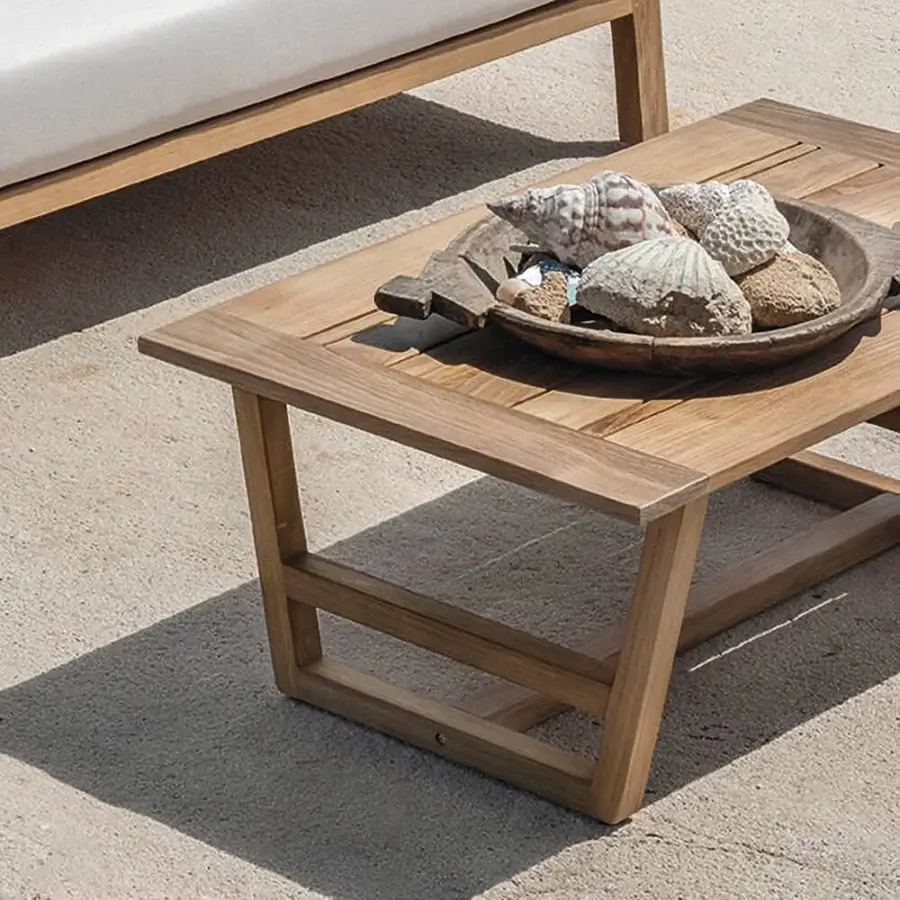 Refined Ethimo Costes coffee table crafted in FSC-certified natural teak wood with a smooth satin finish
