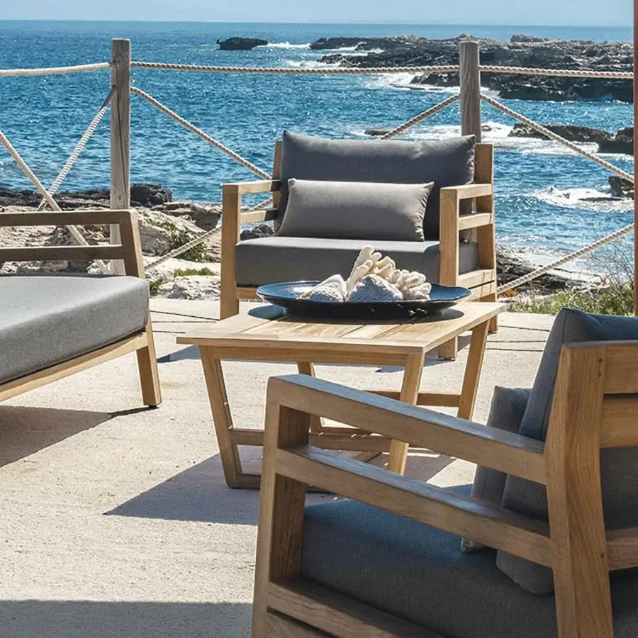 Superior Ethimo Costes coffee table crafted in FSC-certified natural teak with a smooth satin finish