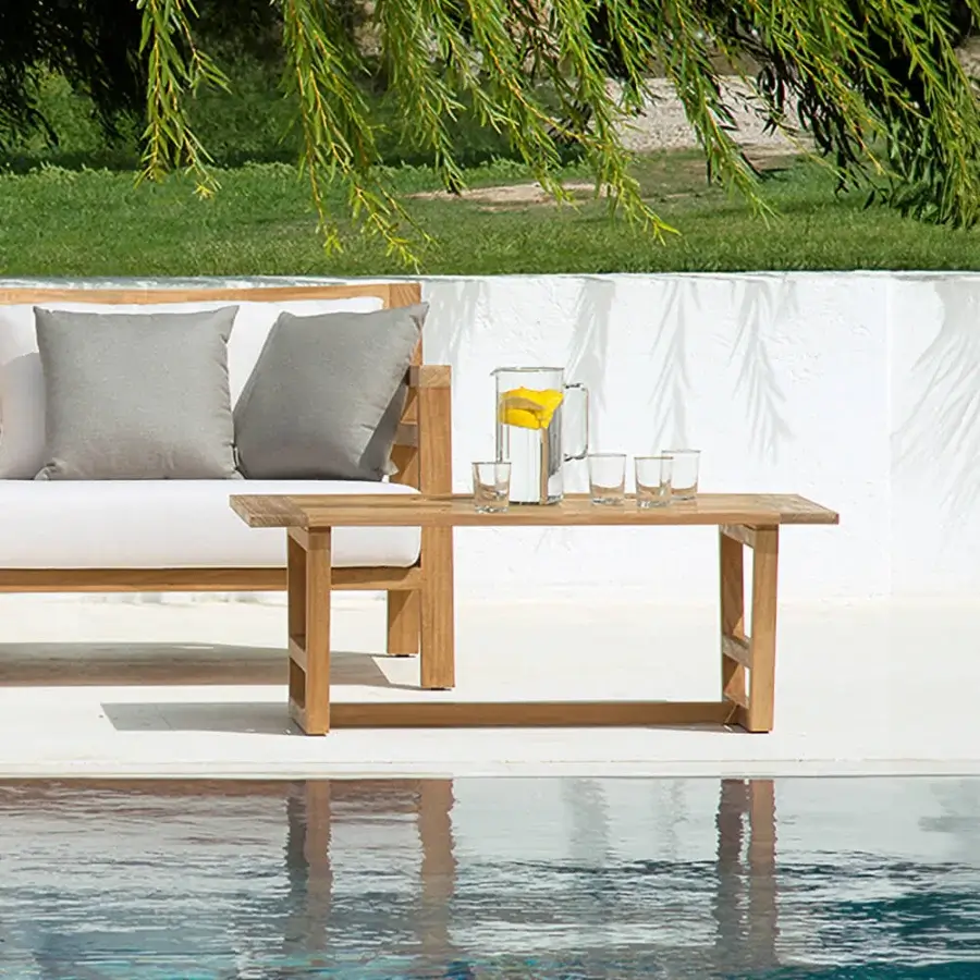 Distinguished Ethimo Costes coffee table crafted in FSC-certified natural teak with a charming worn pickled finish