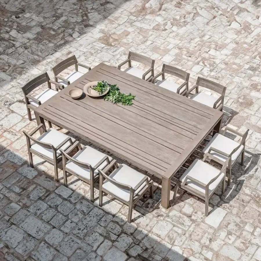 Superior Ethimo Costes table crafted in FSC-certified natural teak with a pickled finish and slatted top