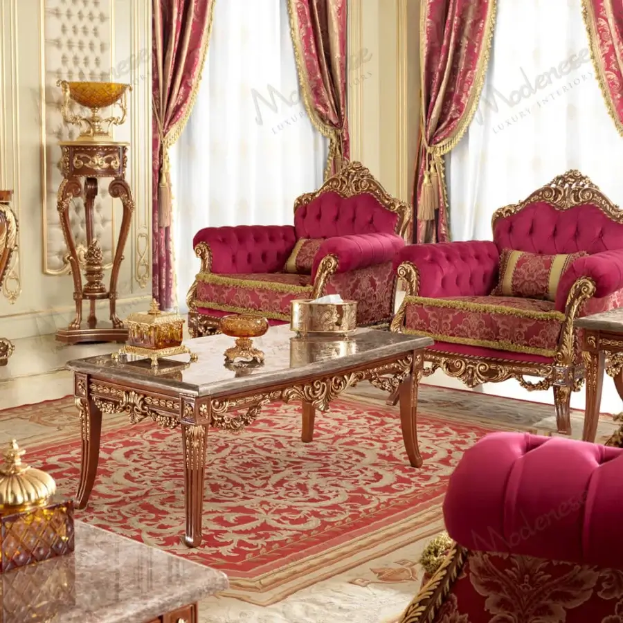 Exquisite Modenese Rubino Delight coffee table crafted with a polished marble top and warm brown wood with gold-leaf carvings