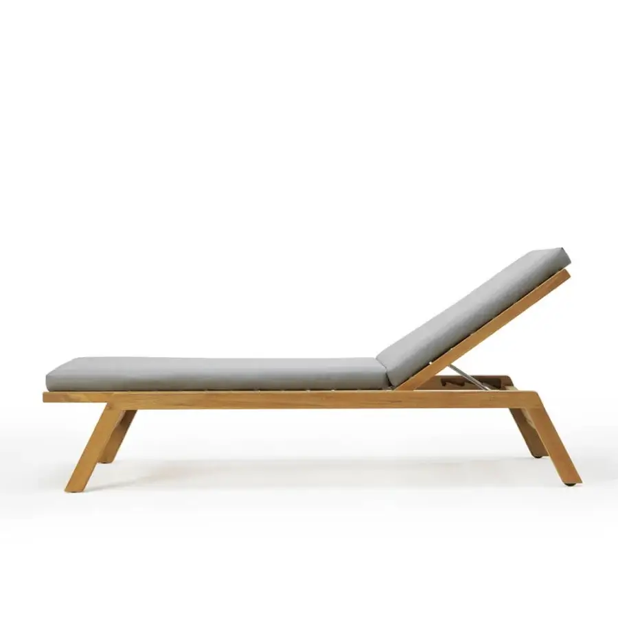 Luxury Ethimo Costes lounger crafted with FSC-certified teak and light gray cushion presenting a warm natural finish