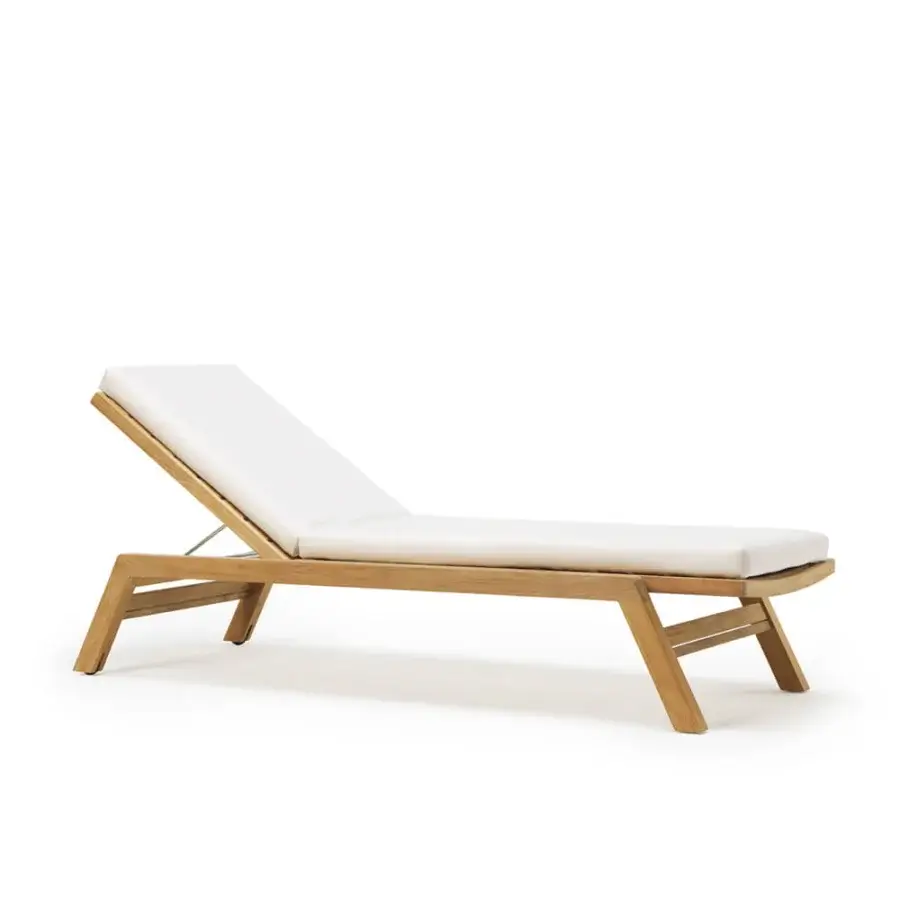 Distinguished Ethimo Costes lounger crafted in FSC-certified teak with a warm natural finish and off-white cushion
