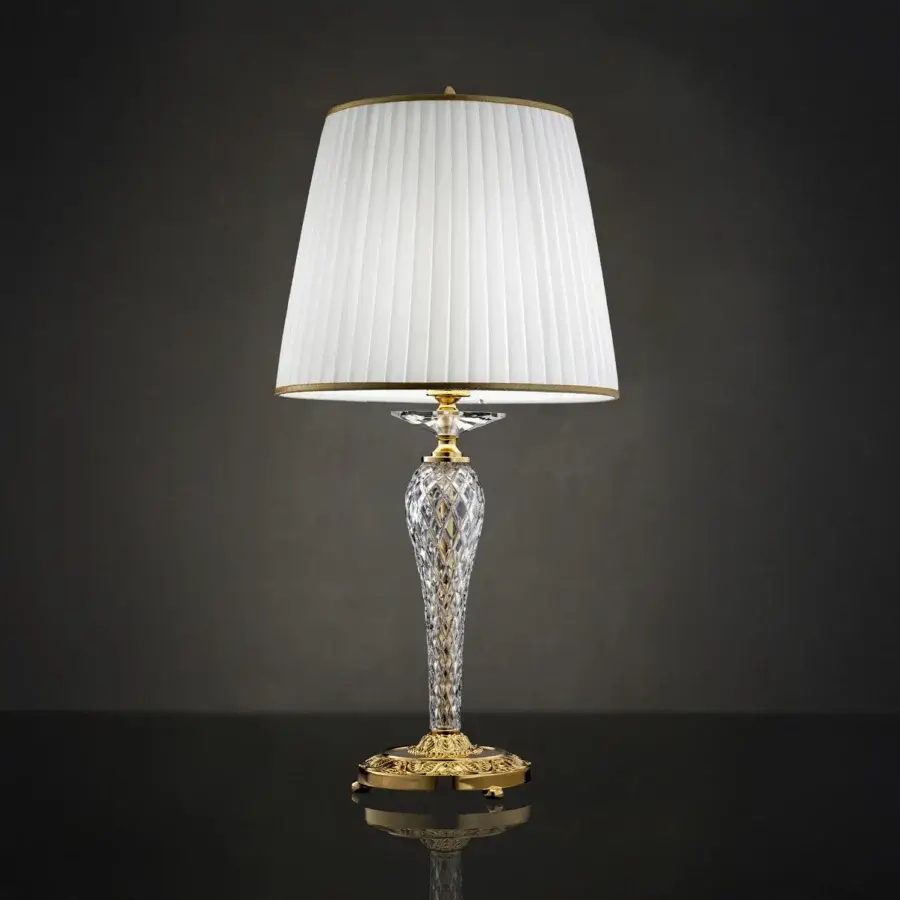 Exclusive Laudarte Carina table lamp with sculpted clear crystal and bronze castings in luminous 24K gold-plated finish
