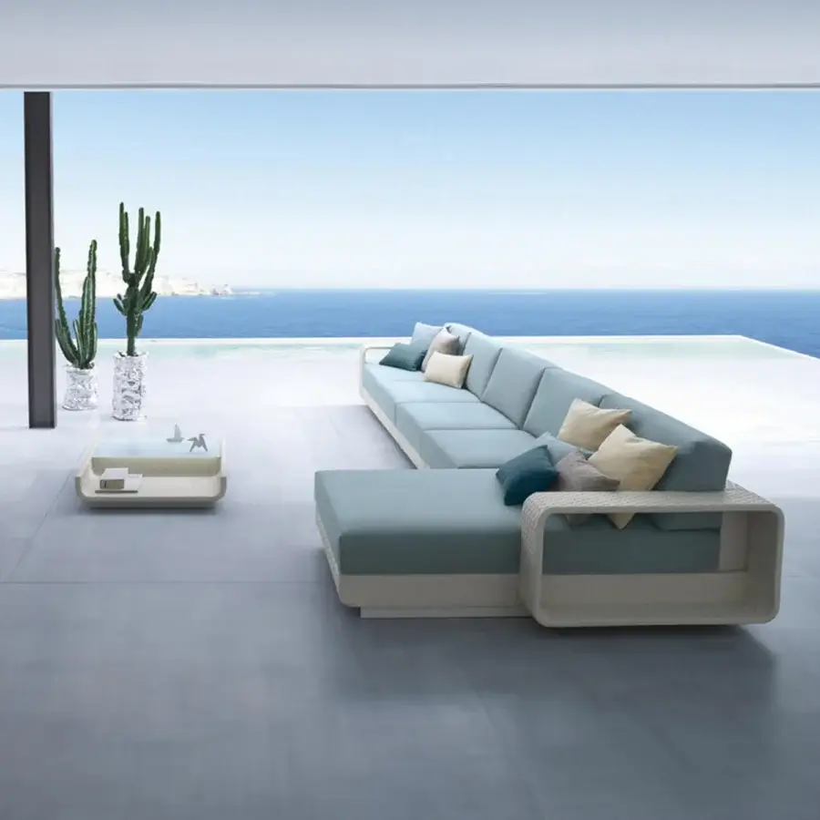 Distinguished Roberti Rattan Hamptons sectional sofa with aluminum frame and Sunweave construction in muted blue-green hues with beige and teal accents