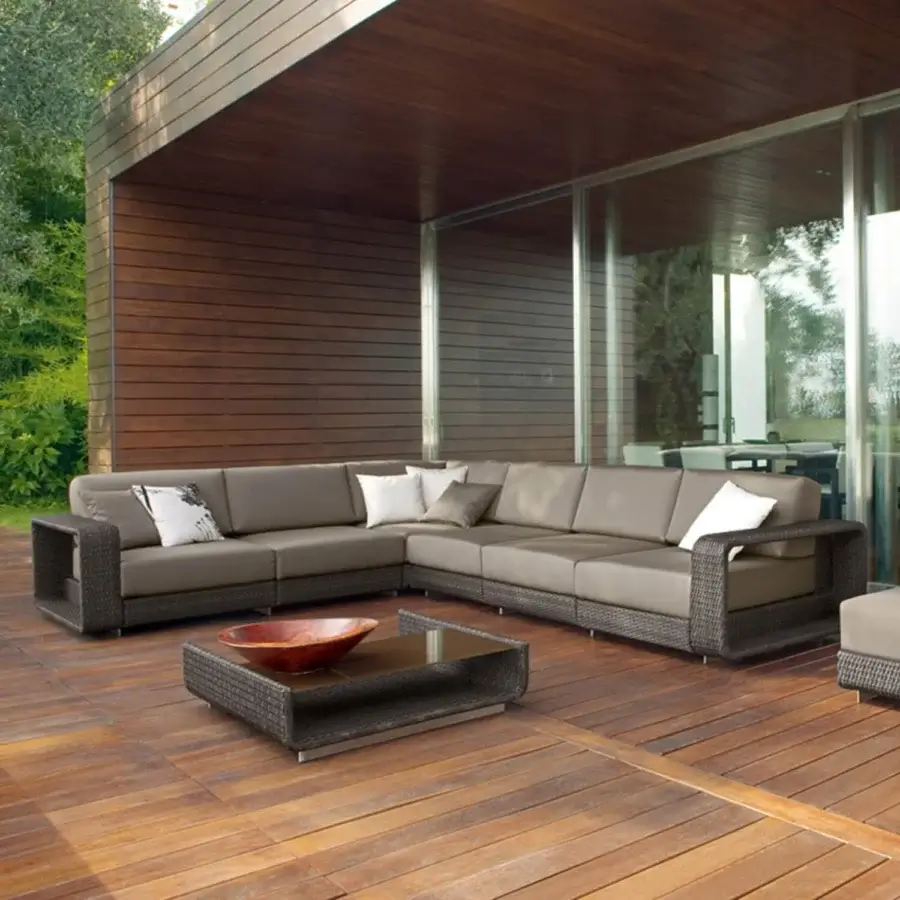 Elegant Roberti Rattan Hamptons sectional sofa with a durable aluminum frame and woven Sunweave material in neutral gray tones