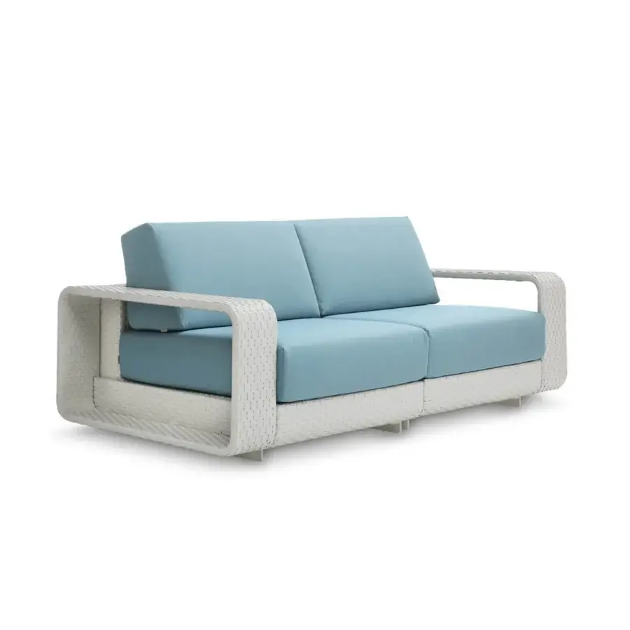 Distinguished Roberti Rattan Hamptons sofa with a durable aluminum frame, woven Sunweave finish, and light blue cushions
