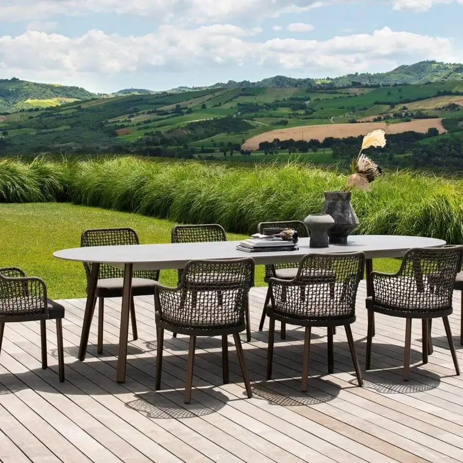 Sophisticated Varaschin Emma table with a light gray HPL top and sleek powder-coated aluminum frame built with dark metal legs