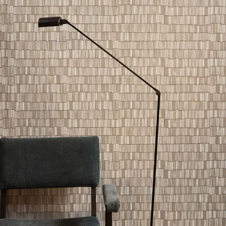 Distinguished Wall&Decò Tavillion wallpaper presents a contemporary geometric design in warm beige textured vinyl with refined embossing