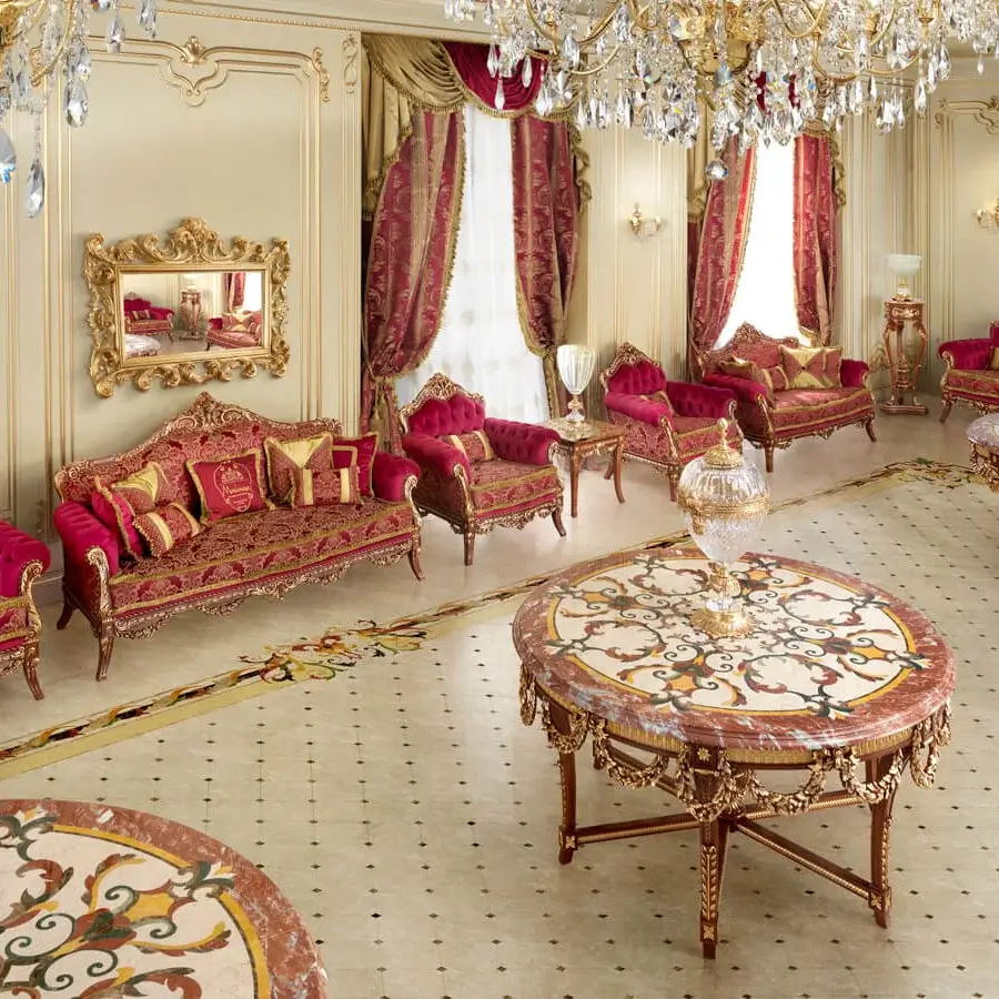Lavish Modenese Rubino Delight mirror crafted in glossy gold with intricate carved floral motifs and reddish-brown detailing in wood