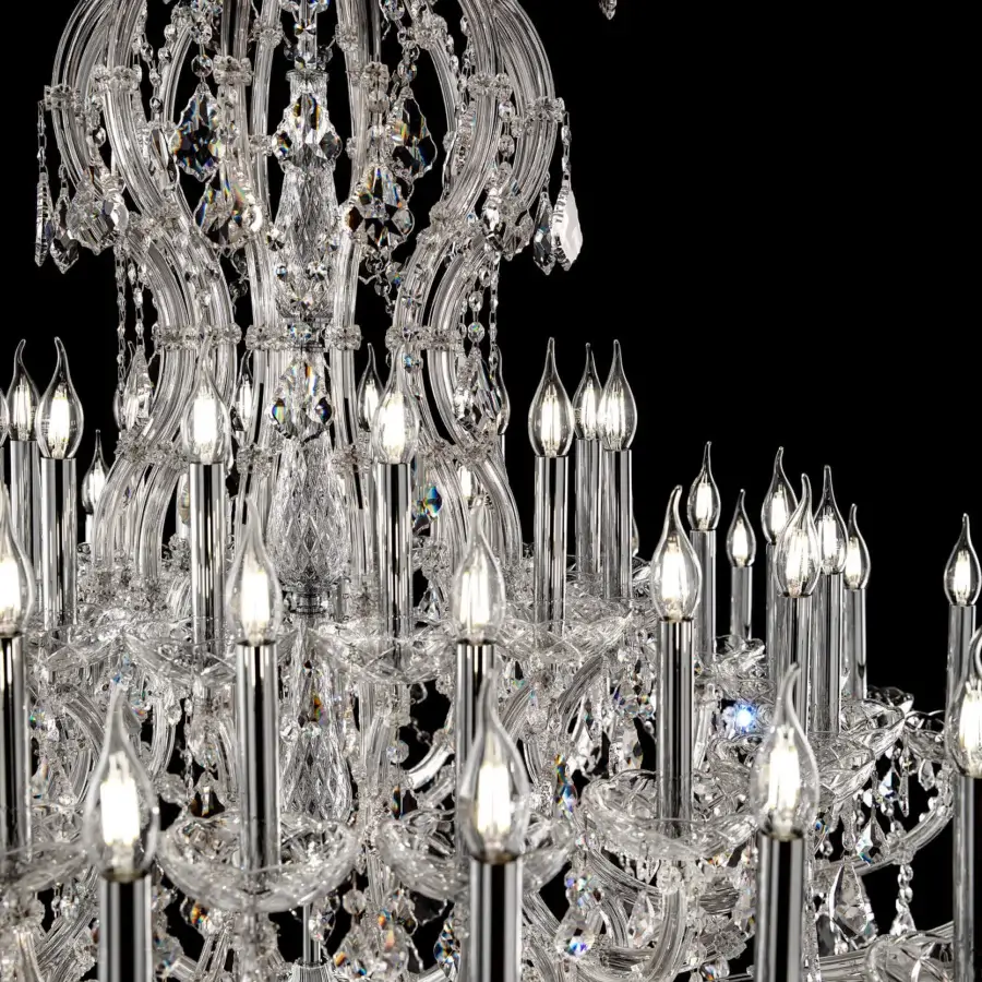 Lavish Laudarte Tarvos chandelier handcrafted in Italy with palladium plating and fifty-four lights plus clear Asfour crystal pendants