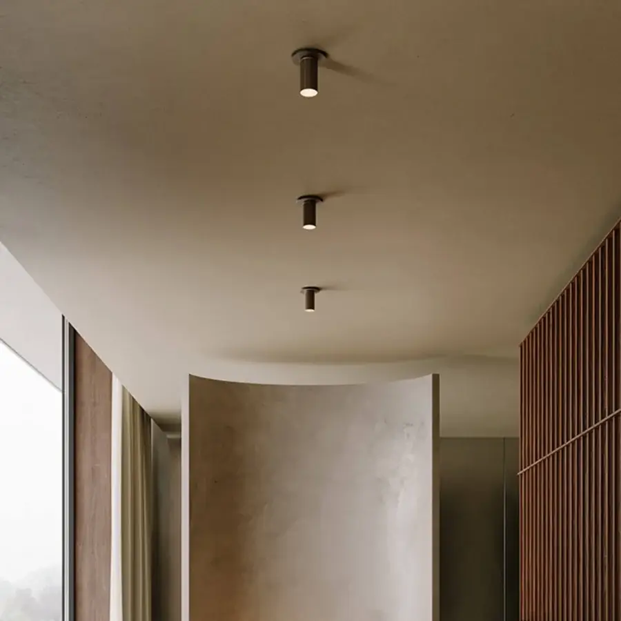 Exceptional VENICEM Beak Point ceiling lamp crafted in burnished brass with a fully knurled matte black surface