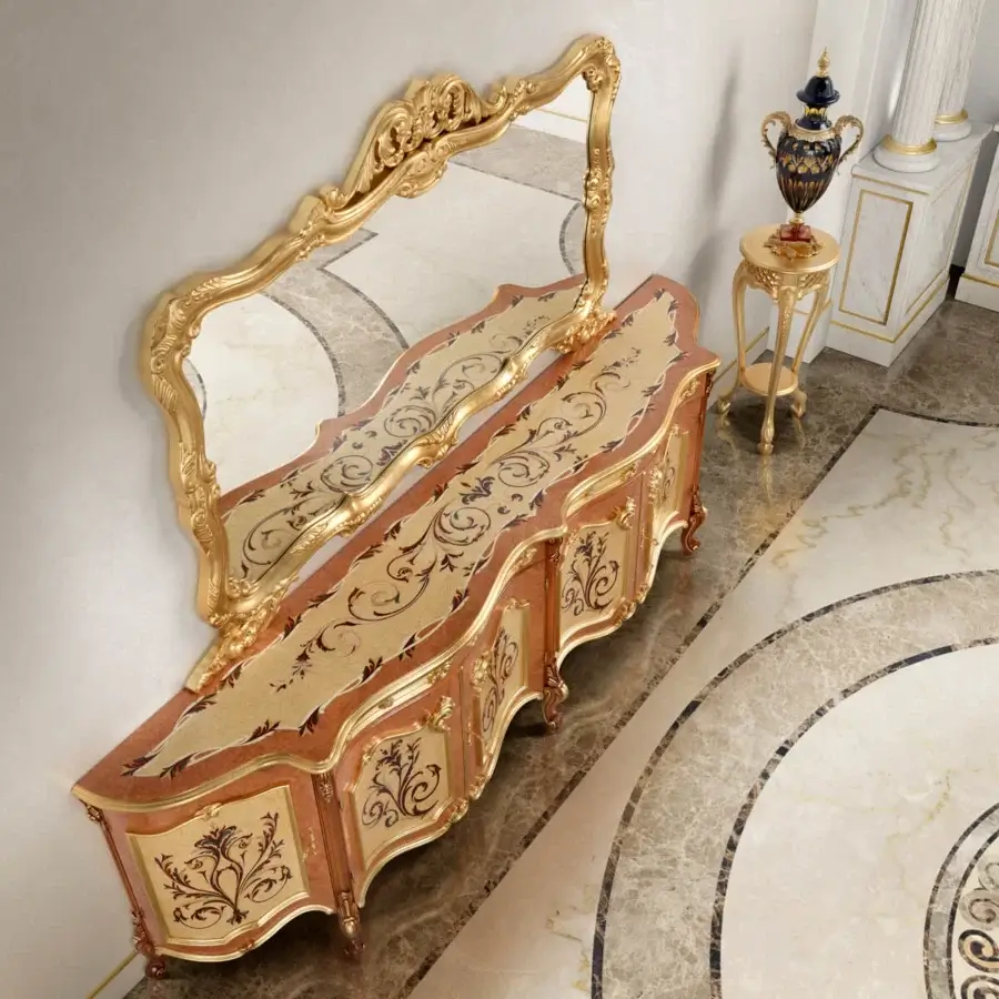 Lavish Modenese Royal Blend mirror crafted with sculpted wood, reddish-brown and gold floral carvings, and gilded metal finish