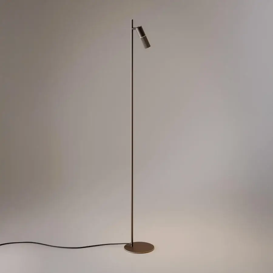 Distinguished VENICEM Beak Floor Lamp crafted in metal with burnished brass and subtle knurled detailing delivers directional illumination