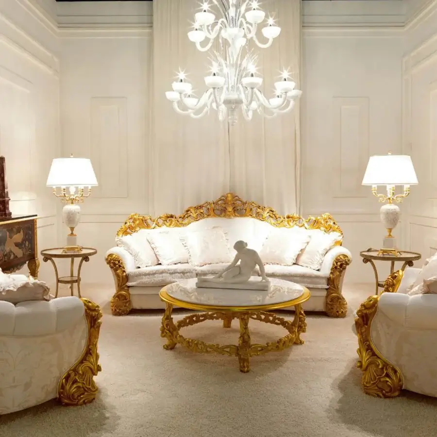 Distinguished Zanaboni Leonardo sofa upholstered in textured off-white floral textile with gold leaf-finished carved wood details