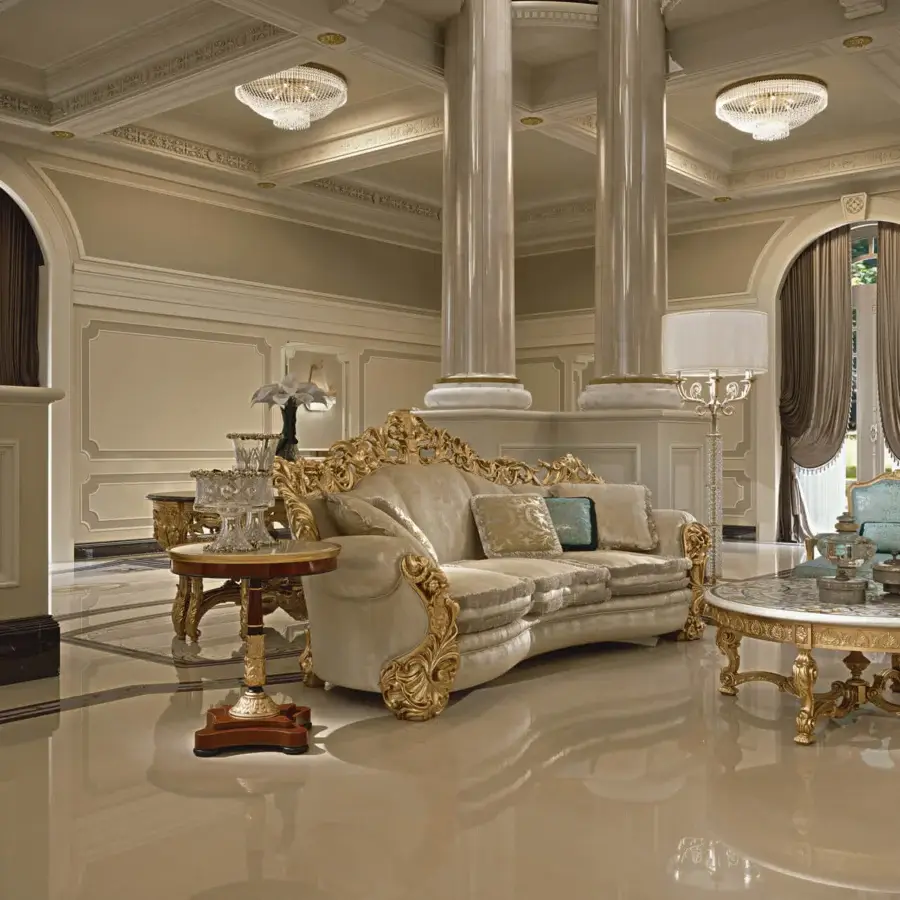 Superior Zanaboni Leonardo sofa with curved silhouette, cream floral upholstery and gold leaf embellished solid wood frame