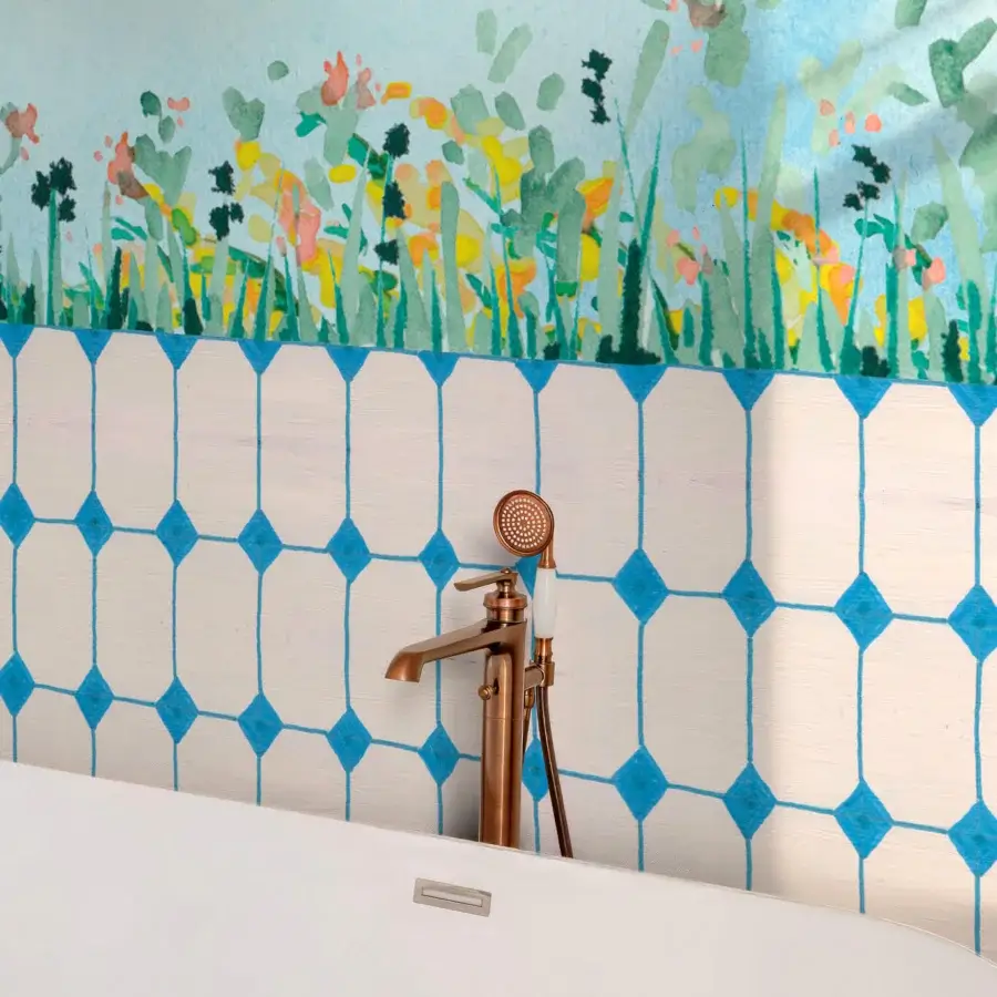Exclusive Wall&Decò Arduino wallpaper presents a watercolor floral scene with a bright blue staggered tile pattern crafted in Italy