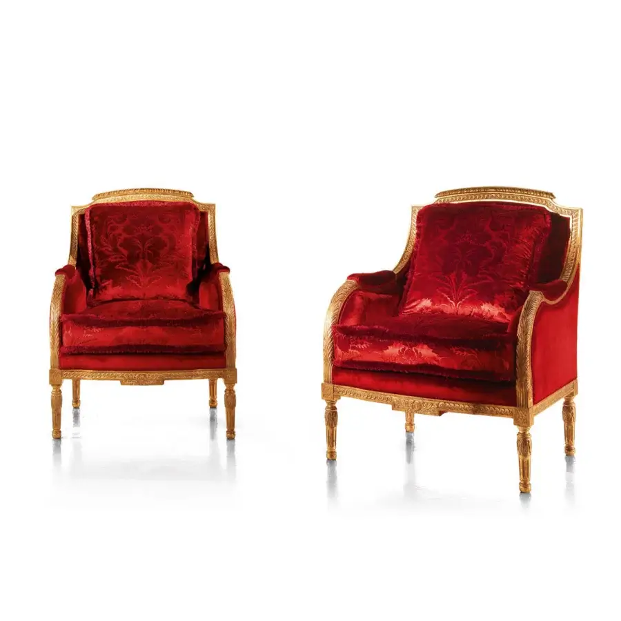 Distinguished Zanaboni 004/C lounge chair upholstered in red floral textile with radiant gold leaf finish carved wood frame