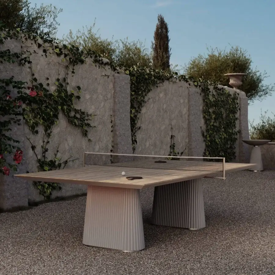 Elegant Vismara Egeo table-tennis table with ceramic stone effect tabletop in Classic Travertino beige and concrete effect legs