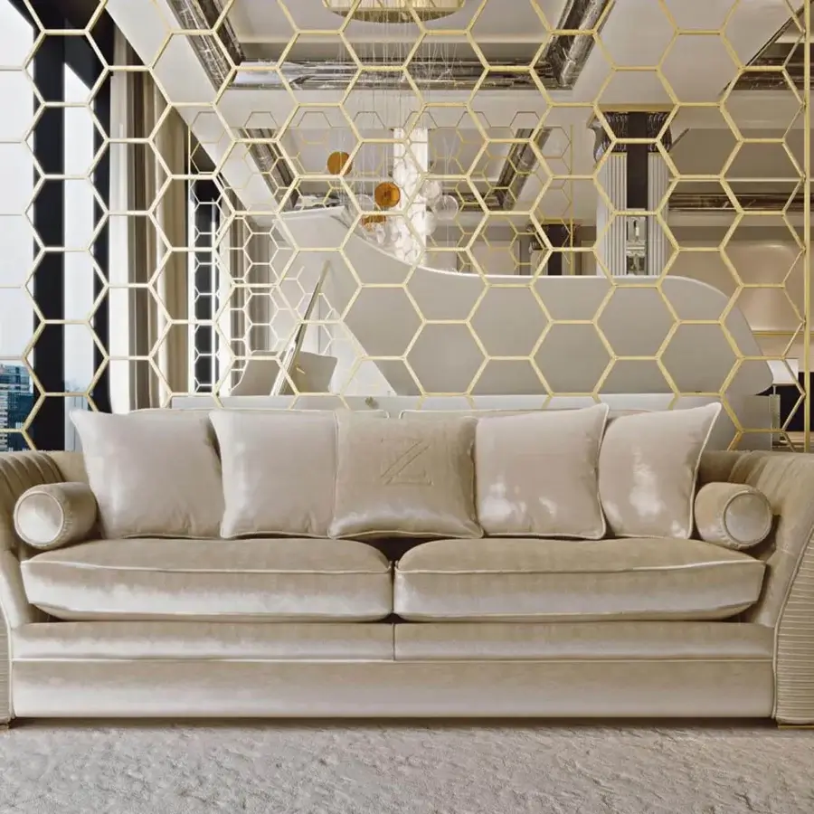 Harmonious Zanaboni Amalfi sofa with muted beige textile upholstery and a stylized “Z” emblem adorning each cushion