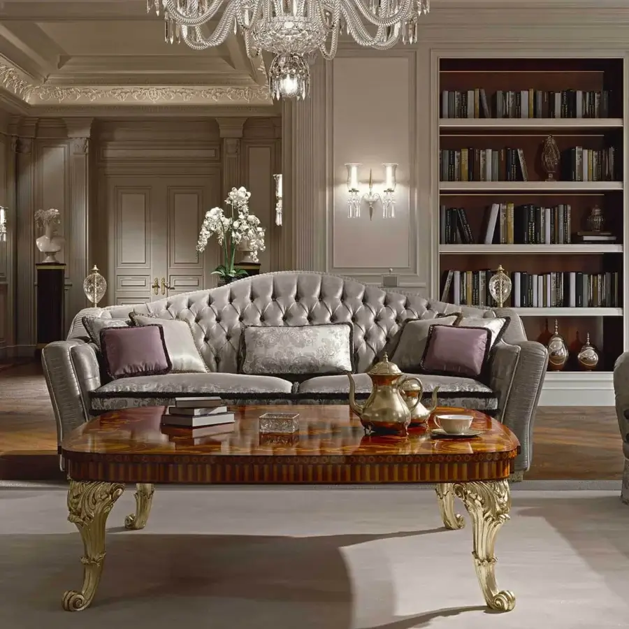 Distinguished Zanaboni Borromeo sofa with deeply quilted muted gray textile and gold leaf-finished solid wood feet