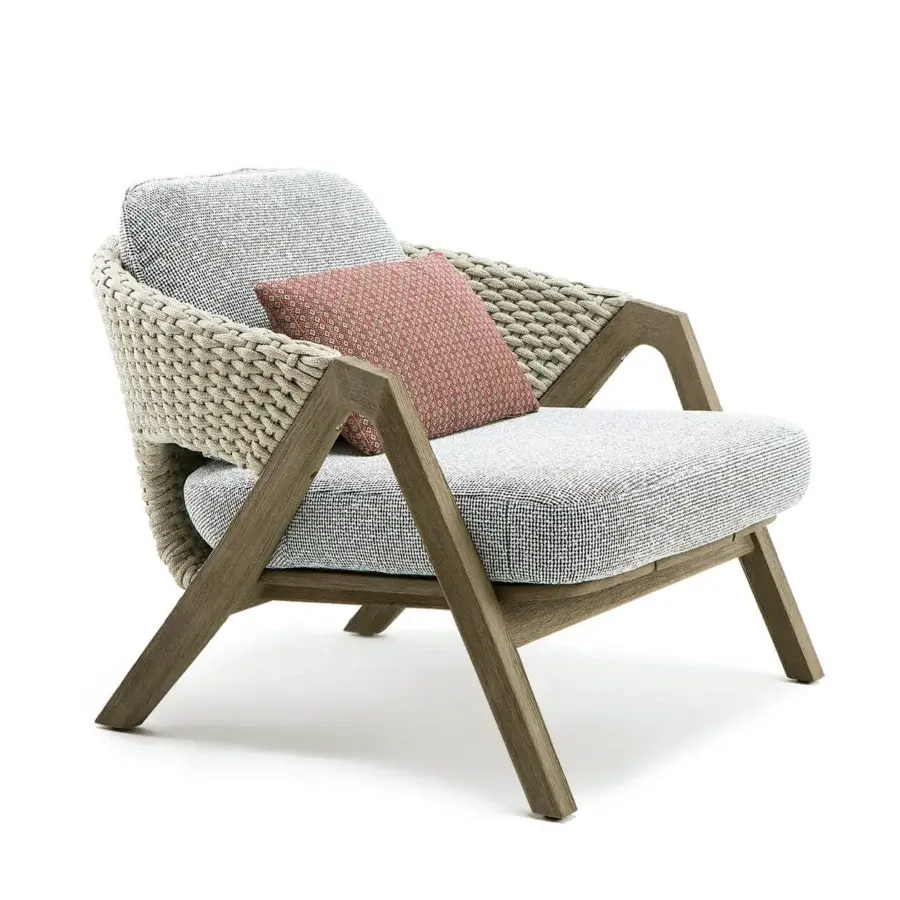 Elegant Ethimo Knit lounge chair with teak wood frame and sophisticated woven gray rope backrest