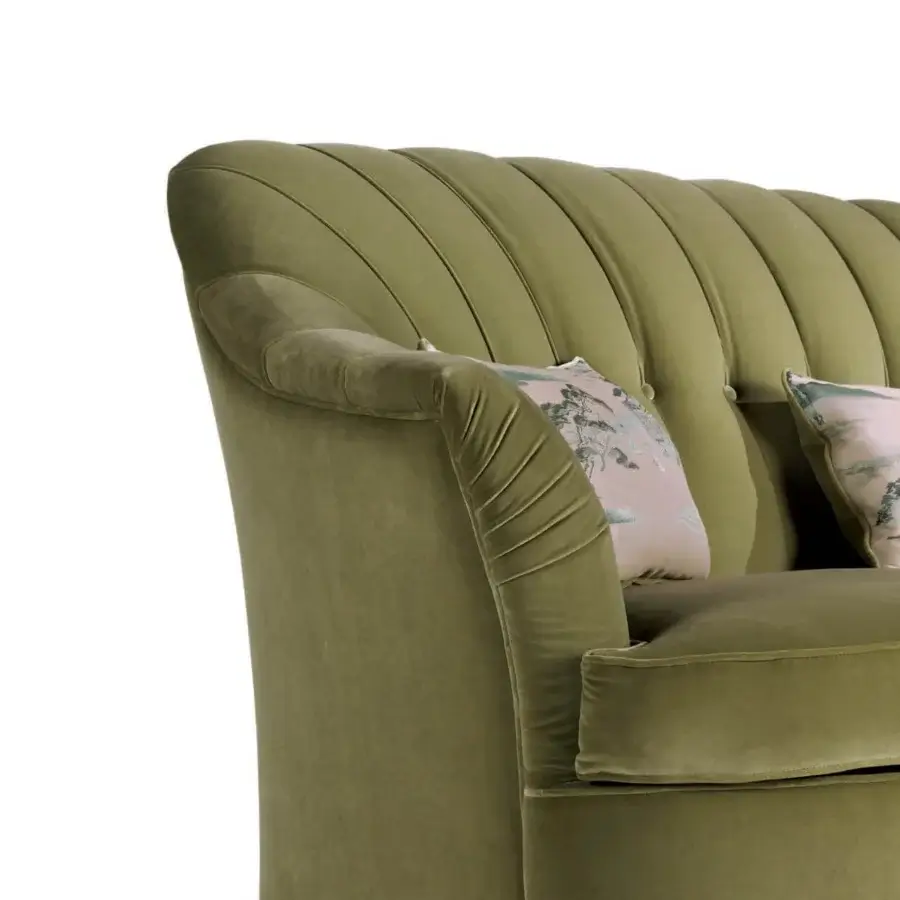 Exceptional Zanaboni Broadway sofa with plush olive green textile upholstery and deeply tufted backrest with pink floral cushions