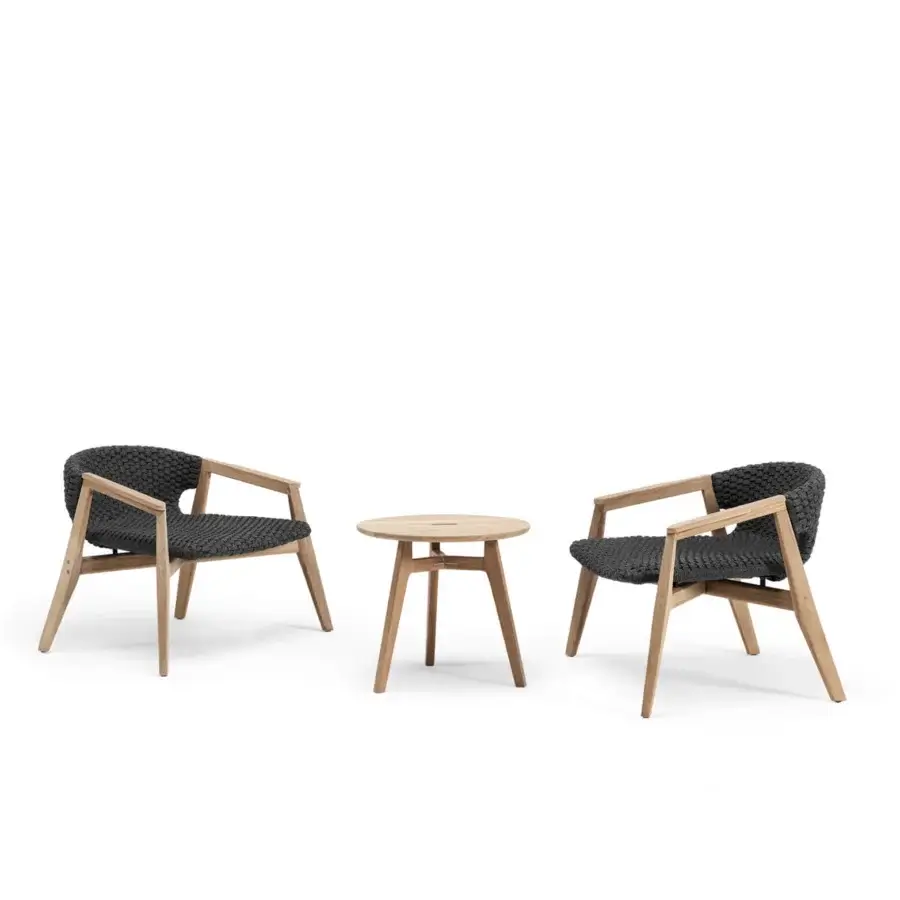 Lavish Ethimo Knit lounge chair crafted with a sinuous FSC-certified teak frame and dark gray woven rope seat with a satin finish