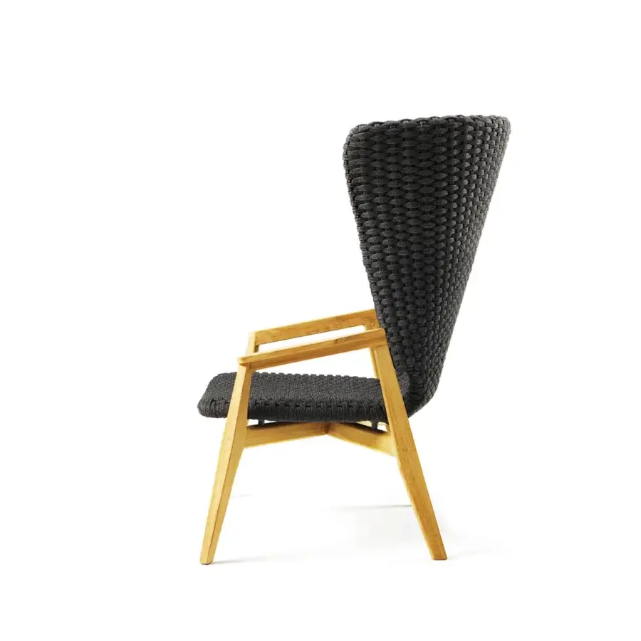 Refined Ethimo Knit lounge chair with a hand-finished teak frame and elegantly woven dark gray rope backrest