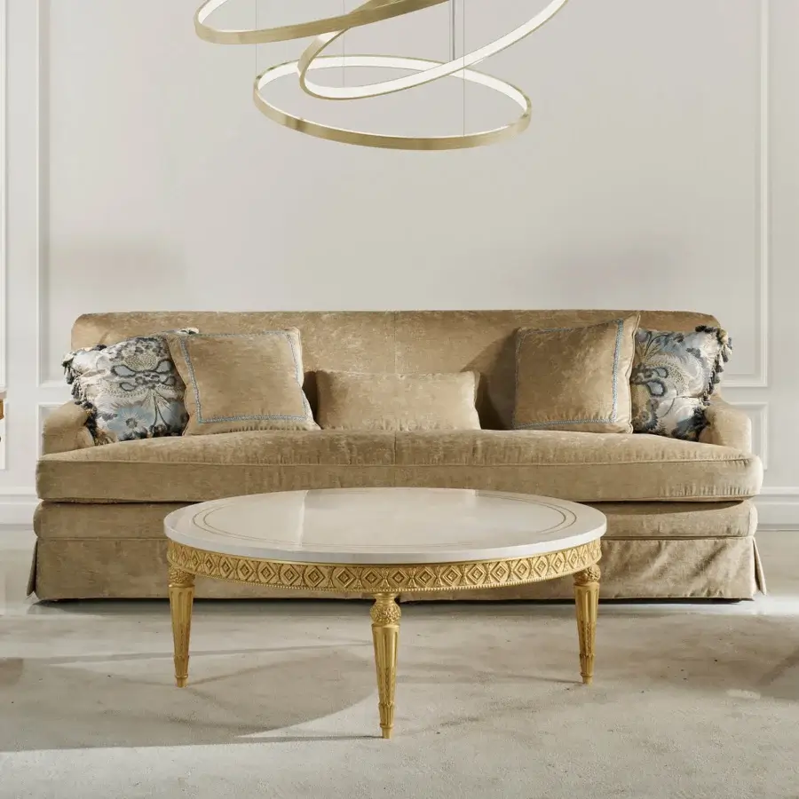 Distinguished Zanaboni Chagall sofa upholstered in textured gold textile with hand-finished floral cushions in blue and cream patterns