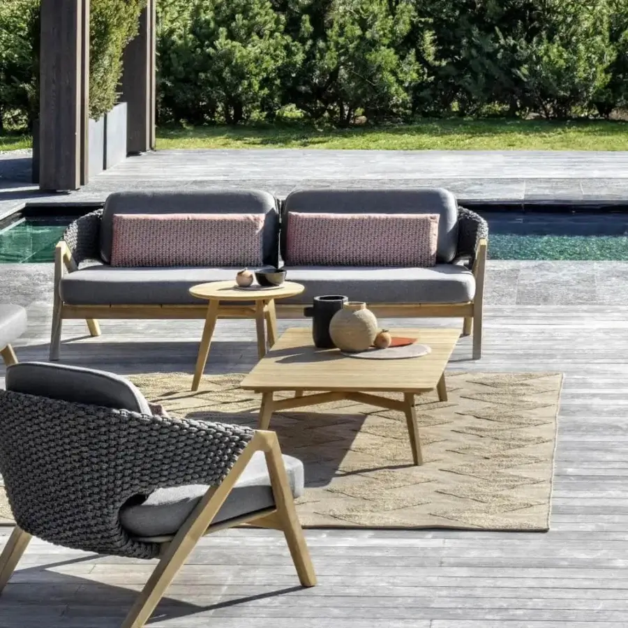 Superior Ethimo Knit coffee table crafted in FSC-certified teak with a smooth satin finish and warm medium-toned brown hue