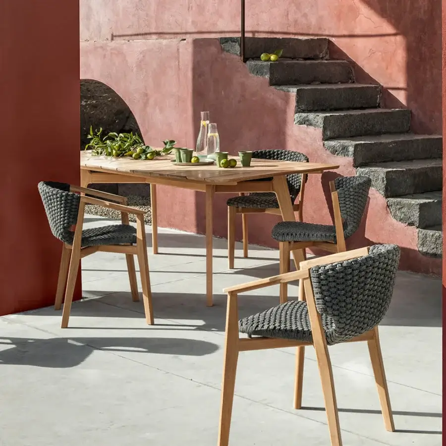 Superior Ethimo Knit chair with dark gray woven rope and FSC-certified teak frame crafted for outdoor living