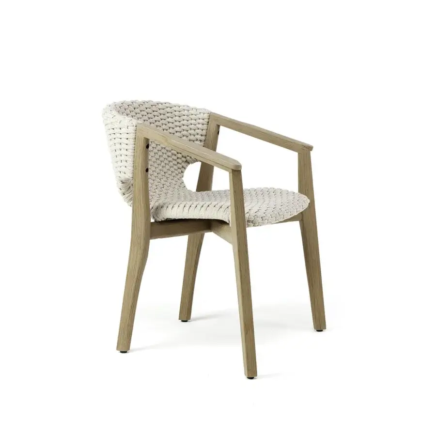 Distinguished Ethimo Knit armchair with a sinuous hand-finished FSC-certified teak frame and woven off-white rope backrest