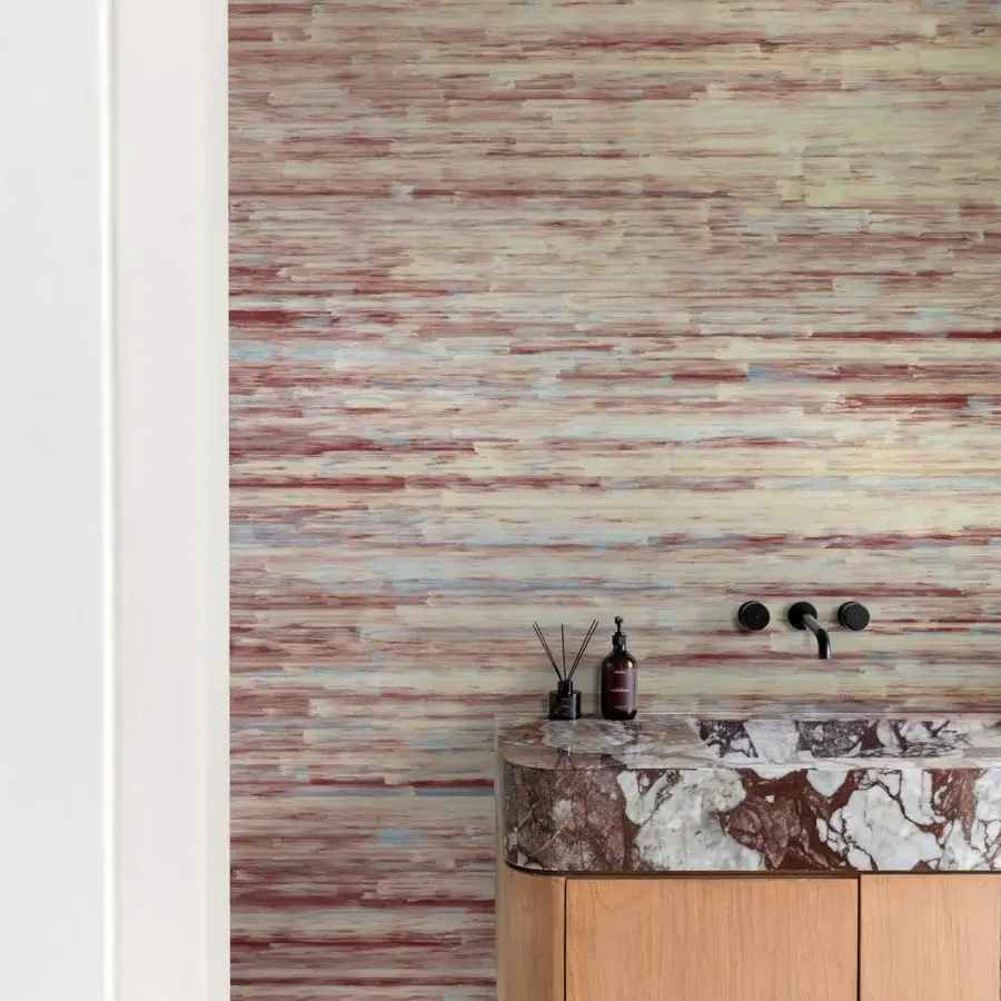 Exclusive Wall&Decò Riverberi wallpaper with woven-fiber effect in reddish-brown, blue, beige, and olive green tones