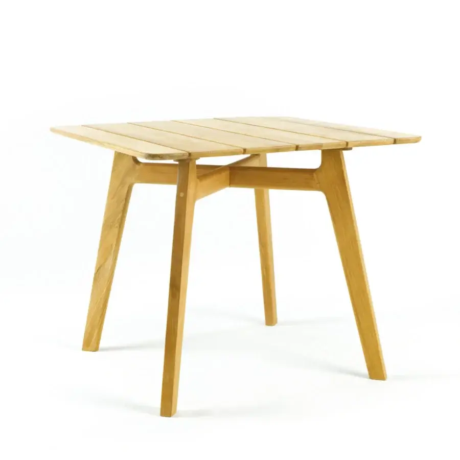 Superior Ethimo Knit table crafted in light brown FSC-certified teak with horizontal slats and splayed legs with a satin finish