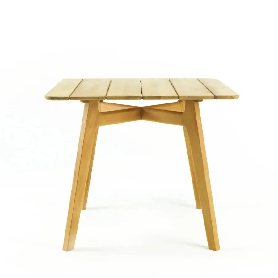 Distinctive Ethimo Knit table crafted in light brown FSC-certified teak with angled legs and satin finish
