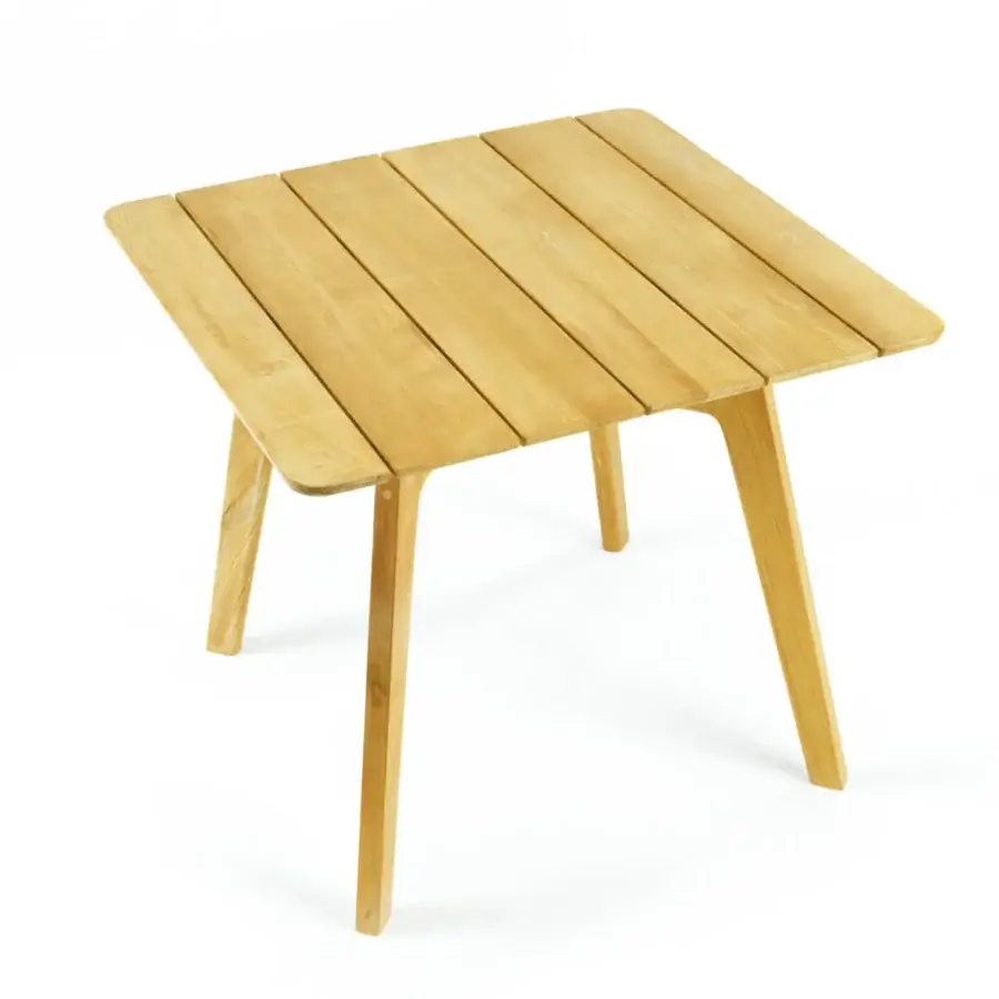 Elegant Ethimo Knit table crafted in honey-brown FSC-certified teak with a subtly textured tabletop and tapered legs